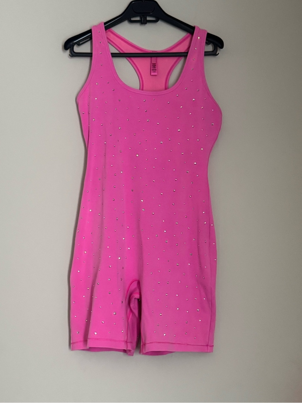 NWOT SKIMS OUTDOOR RHINESTONE
MID THIGH ONESIE I TAFFY/ PINK IN L